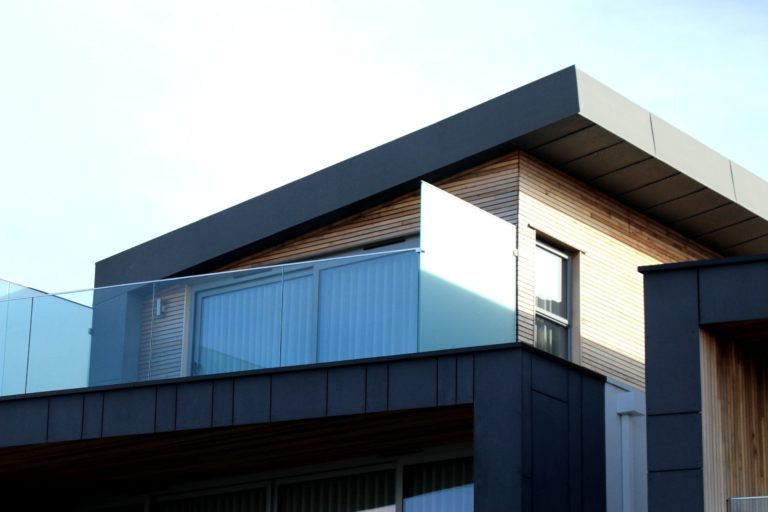 Metal roofed building with balcony